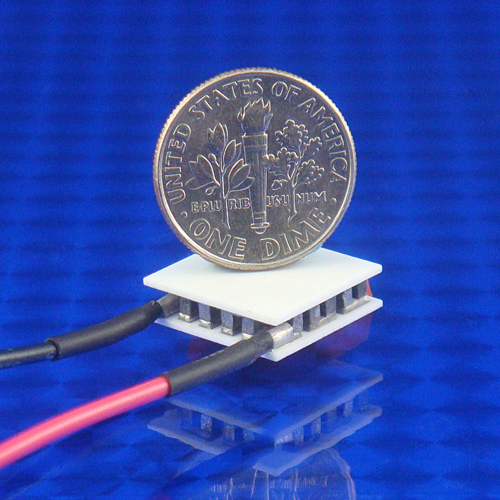 small TEC peltier with US dime on top for scale